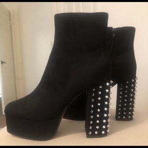 Striking Black Ankle Boots with Spiked Heels